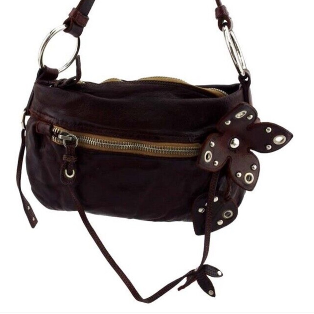 Beautiful vintage brown leather MIU MIU bag. Long brown strap. Zipper closure